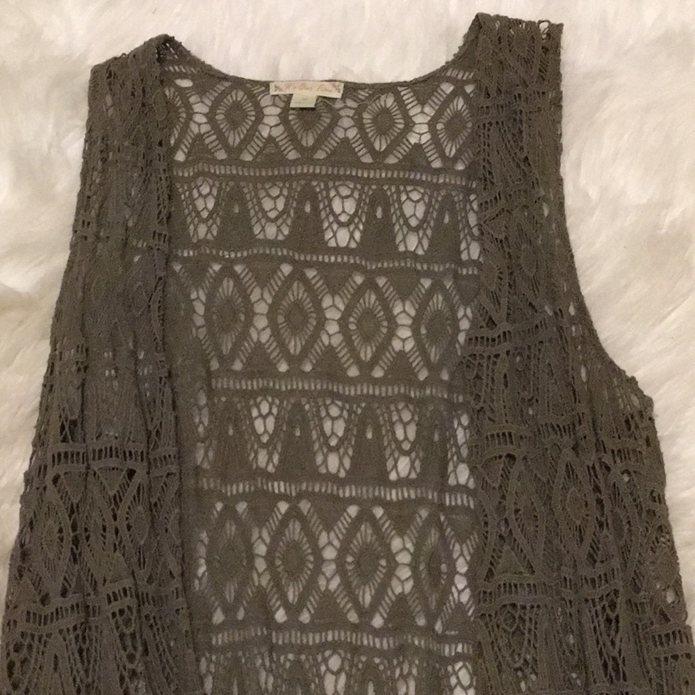 Green sleeveless cardigan